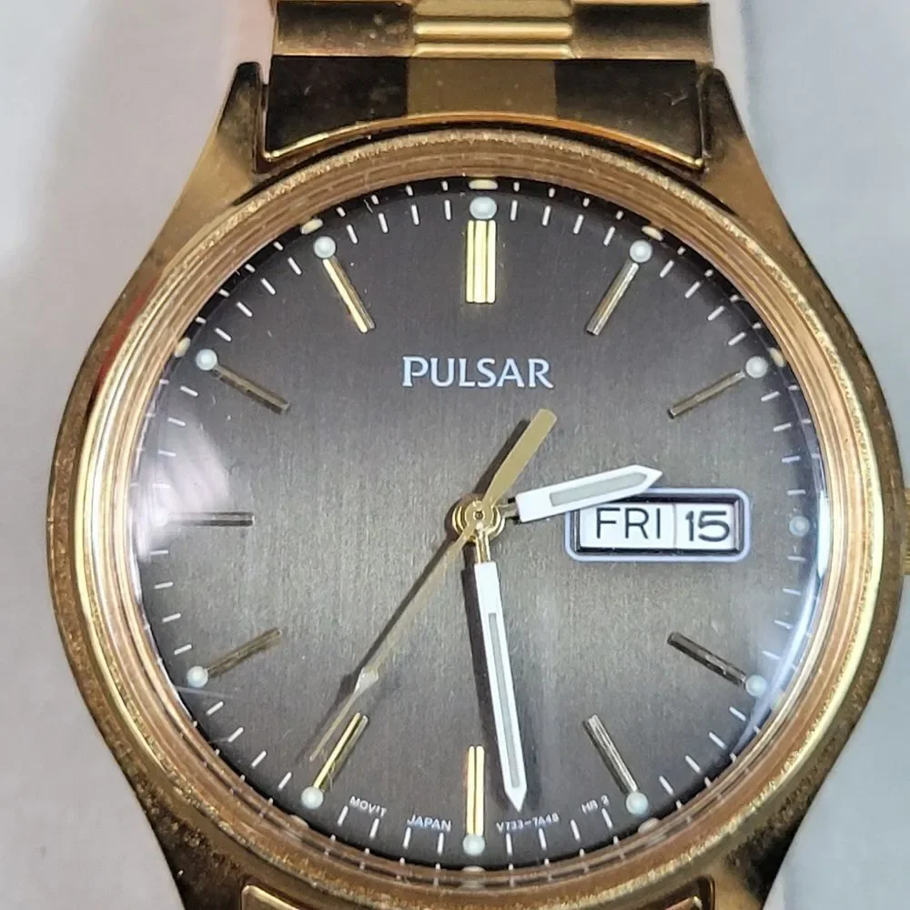 Vtg 90's Pulsar Watch Men Stainless Steel Gold Stretch WR Day Date Black